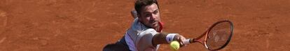 Wawrinka devuelve la pelota en la semifinal contra Tsonga.