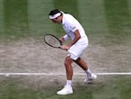 Tennis - Wimbledon - All England Lawn Tennis and Croquet Club, London, Britain - July 3, 2021  Switzerland's Roger Federer celebrates winning his third round match against Britain's Cameron Norrie REUTERS/Paul Childs