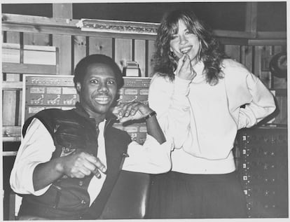 Nile Rodgers and Carly Simon. He wrote the song 'Why' for her. 
