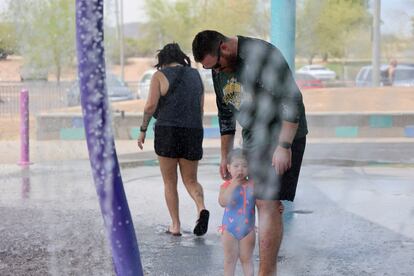 People cool off at a water park during a heatwave in Phoenix, Arizona, U.S., July 16, 2023.