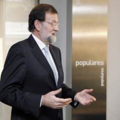 Mariano Rajoy junto con Juan Rosell, presidente de la CEOE