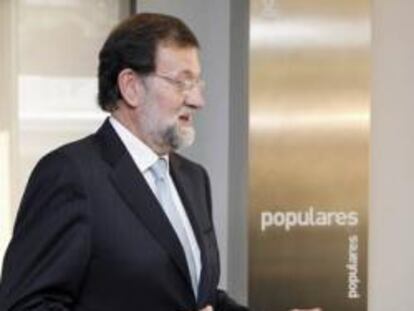 Mariano Rajoy junto con Juan Rosell, presidente de la CEOE