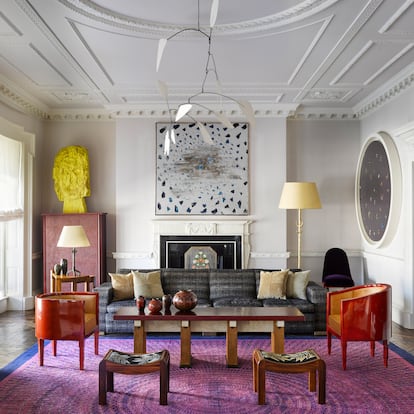 Ruhlmann rug, Alexander Calder mobile, Lucio Fontana's painting 'Concetto spaziale, Il cielo di Venezia' (not for sale) above the fireplace, Georg Baselitz's abstract sculpture (not for sale), and Eugène Printz's sideboard (1933). In the center, two Jean Dunand armchairs, Pierre Chareau table, Dunand vases, and Paul Dupré-Lafon side table.