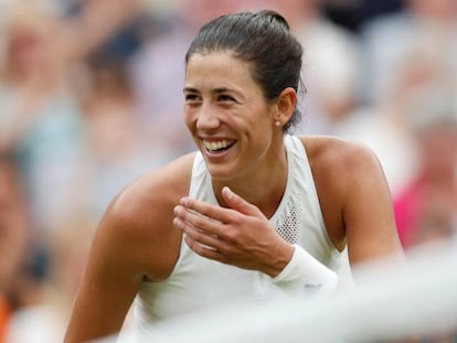 Muguruza celebra su triunfo en la final de Wimbledon contra Venus, en julio.