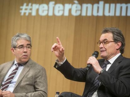 Francesc Homs (izquierda) y Artur Mas, ayer en Barcelona. 