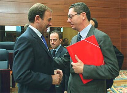 Pío García-Escudero y Alberto Ruiz-Gallardón, en el último debate celebrado sobre el estado de la región.