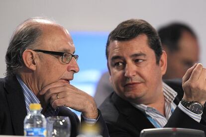 Cristóbal Montoro y Antonio Sanz.