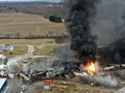 This photo taken with a drone shows portions of a Norfolk and Southern freight train that derailed Friday night in East Palestine, Ohio are still on fire at mid-day Saturday, Feb. 4, 2023.