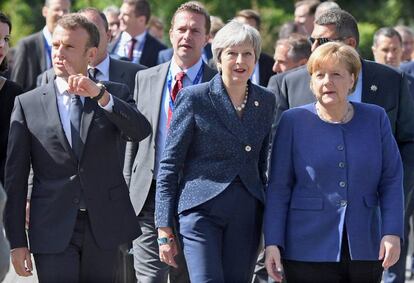 Macron, Theresa May y Angela Merkel, en la cumbre de los Balcanes.