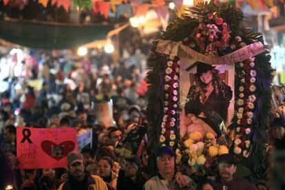 Fans of Mexican-US singer Jenni Rivera follow a memorial procession  in Monterry, Mexico