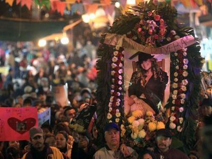Fans of Mexican-US singer Jenni Rivera follow a memorial procession  in Monterry, Mexico