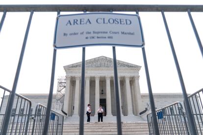 Security works on the steps of the Supreme Court, Friday, June 30, 2023, as decisions are expected in Washington.