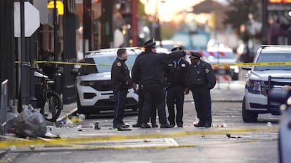 Emergency services attend the scene on Bourbon Street after a vehicle drove into a crowd on New Orleans' Canal and Bourbon Street, Wednesday Jan. 1, 2025. (AP Photo/Gerald Herbert)