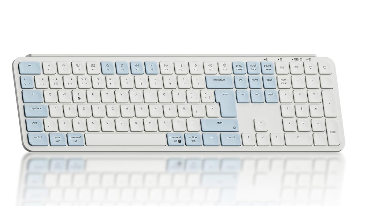 Teclado inalámbrico y ergonómico en rosa pastel con ratón incluido.