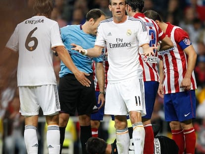 Real record signing Gareth Bale claims his innocence after a clash with Thibaut Courtois