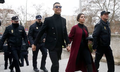 Ronaldo and his partner, Georgina Rodríguez, arrive at the Madrid court on Tuesday morning.