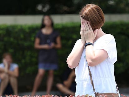 A woman weeps in Orlando after the nightclub massacre.