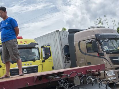 Camioneros a la espera de pedidos en Guiyang