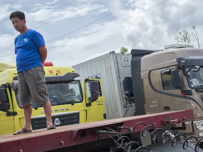 Camioneros a la espera de pedidos en Guiyang