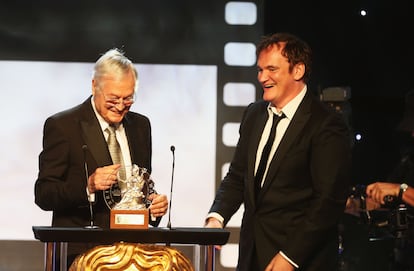 Quentin Tarantino receives an award in 2012 from John Carpenter.
