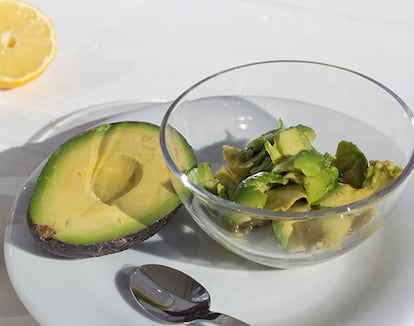 Ingredients of avocado cream on white ground