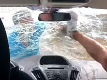 The man climbed on top of the Spaniards’ vehicle and smashed in the windshield for reasons that remain unclear. The country’s prime minister has apologized for the incident