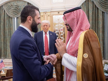 Ahmed Al-Sharaa greets Saudi Crown Prince Mohammed bin Salman, as Trump looks on, in Riyadh.