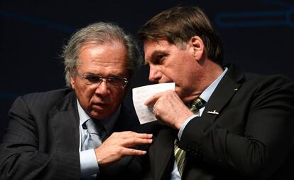 O ministro Paulo Guedes e o presidente Jair Bolsonaro, no dia 11, no Rio.