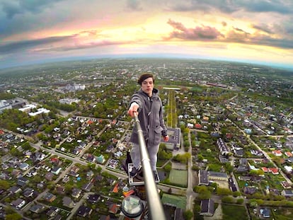 The Parkour athlete Ervin Punkar taking a selfie from a television tower in Tartu, Estonia.
