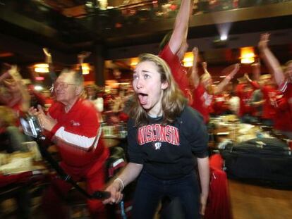 Wisconsin fans celebrate their team’s victory in the semifinals.