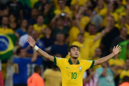 Brazil's forward Neymar celebrates after scoring against Spain during their FIFA Confederations Cup Brazil 2013 final match.