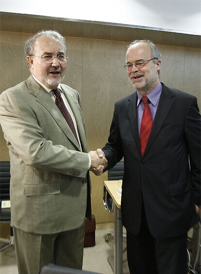 El ministro Pedro Solbes y el consejero Antoni Castells.
