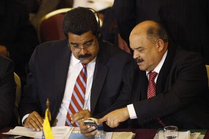 Maduro y Nelson Merentes.