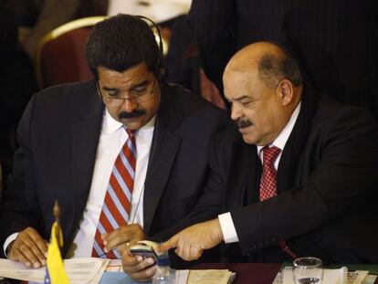 Maduro y Nelson Merentes.