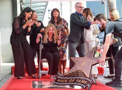 Christina Applegate unveils her star on the Hollywood Walk of Fame, surrounded by friends and former co-stars.