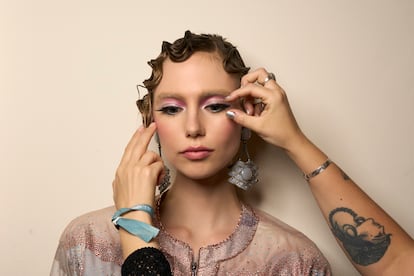 If the eye makeup is dramatic, as in the Giorgio Armani spring/summer 2024 show, experts advise starting there.