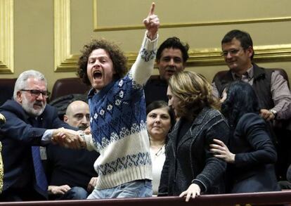 Protestors are removed from the galleries in Congress Tuesday during a debate over new measures for evictions.