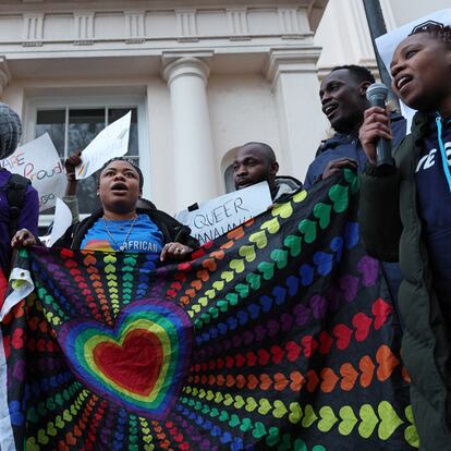 People gather outside the Ghana High Commission in London on March 6, 2024, to protest against Ghana's anti-LGBTQ+ bill, now delayed until the Supreme Court rules on a legal challenge. Last week lawmakers approved the bill which seeks to severely curtail LGBTQ rights, drawing condemnation from rights activists despite gaining wide support in the conservative West African state. The proposed legislation stipulates jail terms of six months to three years for engaging in LGBTQ sex and sentences of between three to five years for promoting or sponsoring LGBTQ activities. (Photo by Adrian DENNIS / AFP) (Photo by ADRIAN DENNIS/AFP via Getty Images)