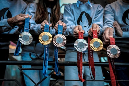 This picture shows upcoming Paris 2024 Olympics medals designed by Fench luxury jewellery house Chaumet, on February 01, 2024 during their presentation at the Eiffel tower in Paris