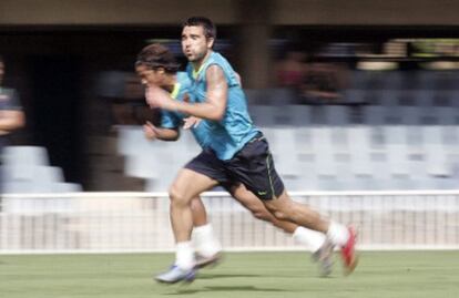 Deco con Giovani Dos Santos en un entrenamiento