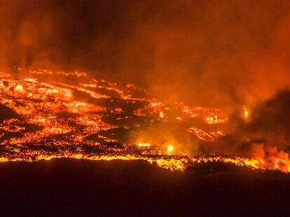 Lava destroys a home in the Canary Island of La Palma on Saturday.