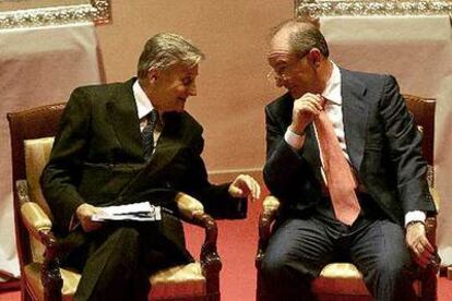 Jean-Claude Trichet, presidente del BCE, junto a Rodrigo Rato, director gerente del FMI.