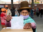 A woman casts her ballot during general elections in La Paz, Bolivia, Sunday, Oct. 18, 2020. (AP Photo/Martin Mejia)