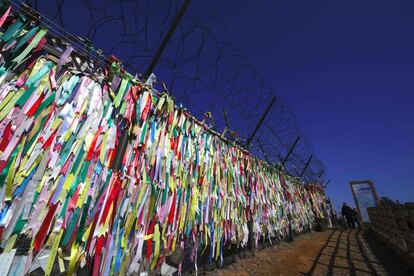 This photo taken on February 12, 2017 shows ribbons with inscriptions calling for peace and reunification hung from a military barbed wire fence at Imjingak peace park in the border city of Paju near the Demilitarized Zone (DMZ) dividing the two Koreas.
Built to keep out migrants, traffickers, or an enemy group, border walls have emerged as a one-size-fits-all response to the vulnerability felt by many societies in today's globalized world, says an expert on the phenomenon.
Practically non-existent at the end of World War II, by the time the Berlin Wall fell in 1989 the number of border walls across the globe had risen to 11.
That number has since jumped to 70, prompted by an increased sense of insecurity following the September 11, 2001 attacks in the United States and the 2011 Arab Spring, according to Elisabeth Vallet, director of the Observatory of Geopolitics at the University of Quebec in Montreal (UQAM).

This image is part of a photo package of 47 recent images to go with AFP story on walls, barriers and security fences around the world. More pictures available on afpforum.com / AFP PHOTO / JUNG Yeon-Je