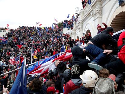 Pro-Trump protesters storm into the U.S. Capitol during clashes with police, during a rally to contest the certification of the 2020 U.S. presidential election results, in Washington, January 6, 2021.