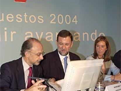 Mariano Rajoy junto a Ana Mato y Cristóbal Montoro en las jornadas del PP.
