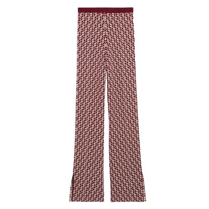 Claudie Pierlot firma este conjunto de jersey cropped y pantalones acampanados de punto.