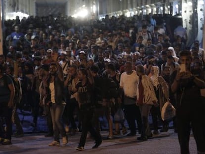 Refugiados sírios chegam ao porto do Pireu, em Atenas, no dia 1 de setembro.