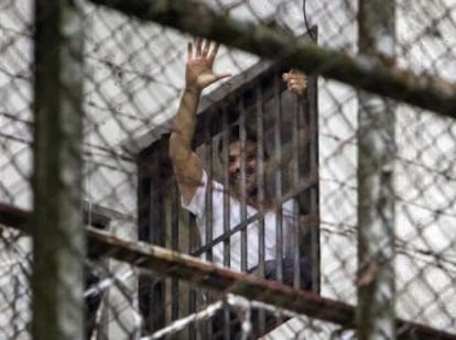 Venezuelan political opposition leader Leopoldo Lopez in the window of his prison cell in 2014.