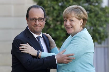 Hollande y Merkel, en su encuentro en el El&iacute;seo.